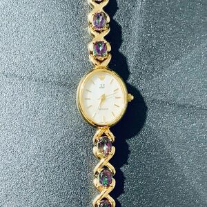 Gold Watch with Stainless Steel Back